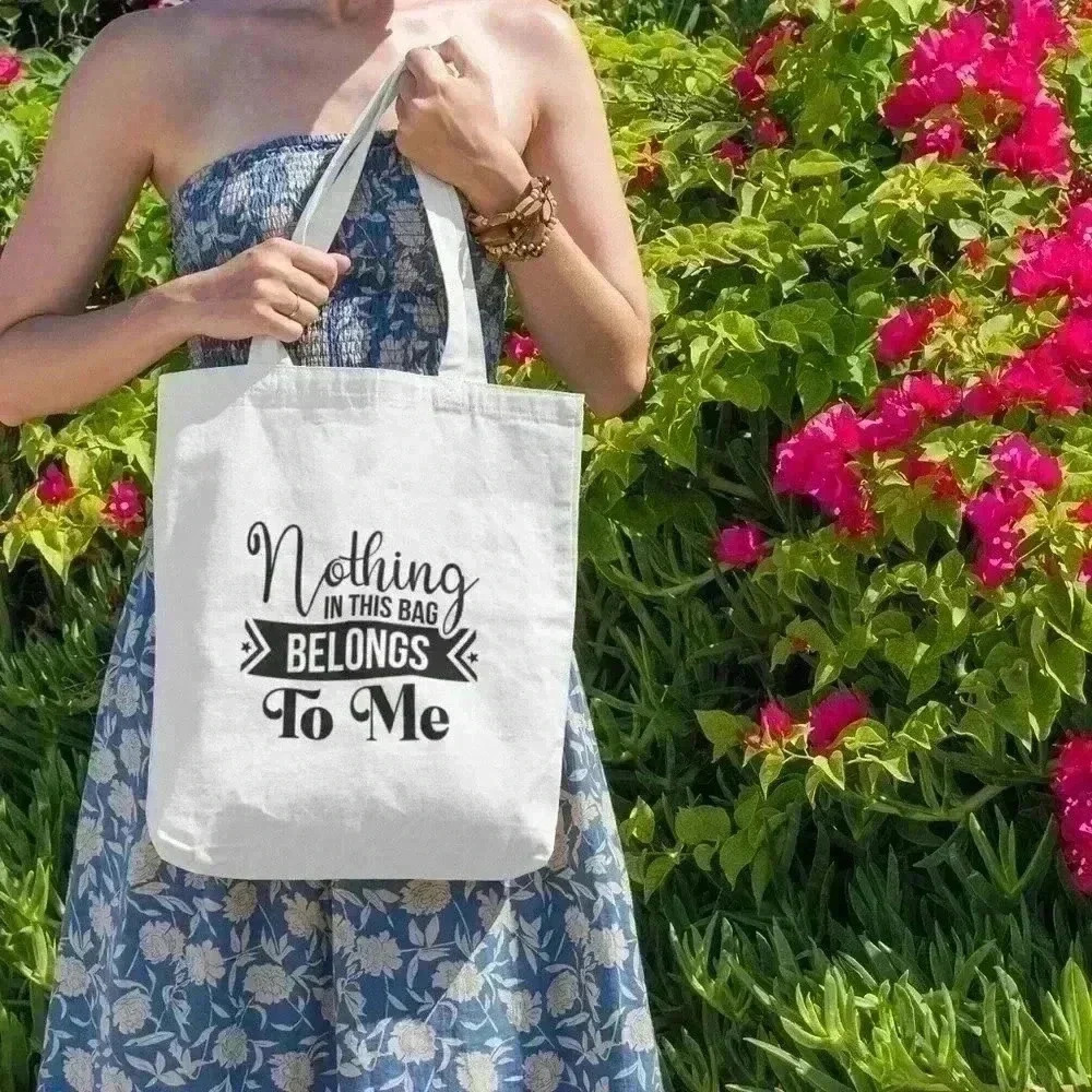 Nothing in this bag belongs to me recycled tote bag